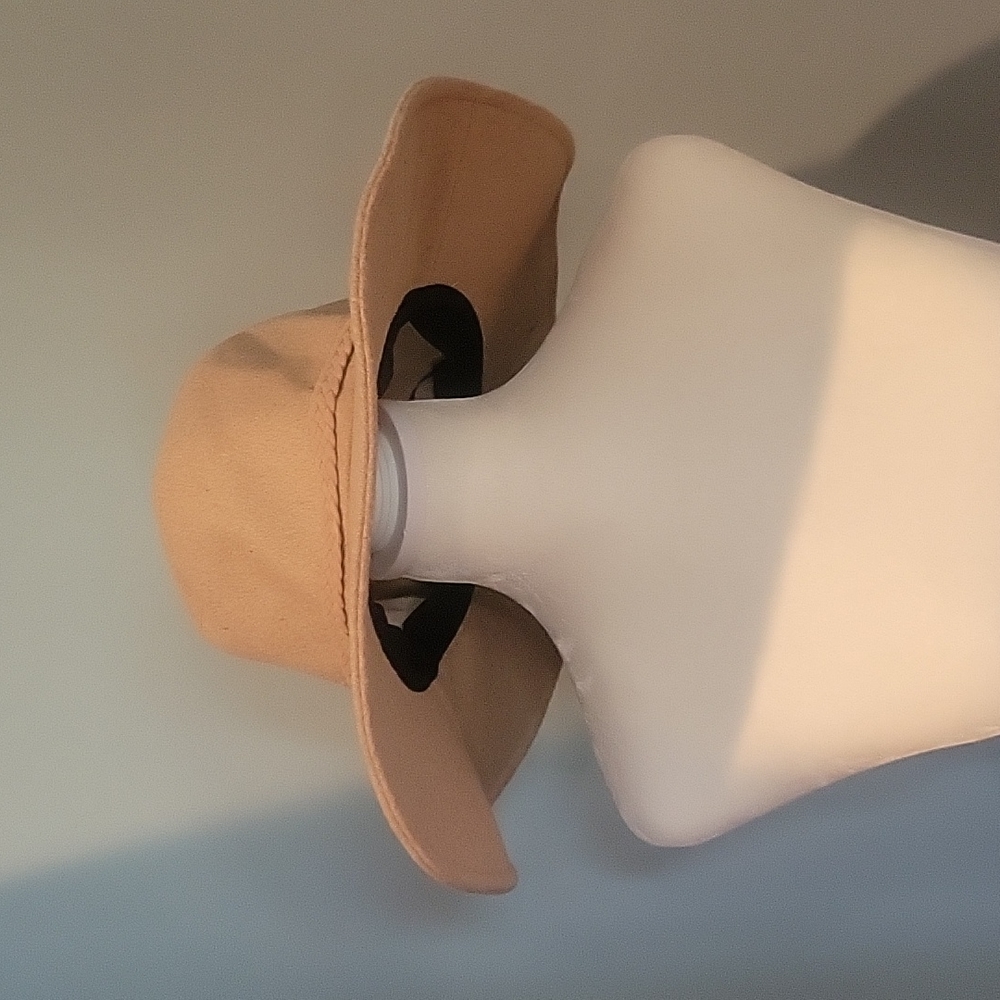 Collapsible, Tan travel hat. Adjustable rim. Braided details. Never worn. NWT.